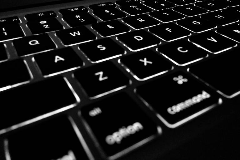 black laptop keyboard with backlit keys